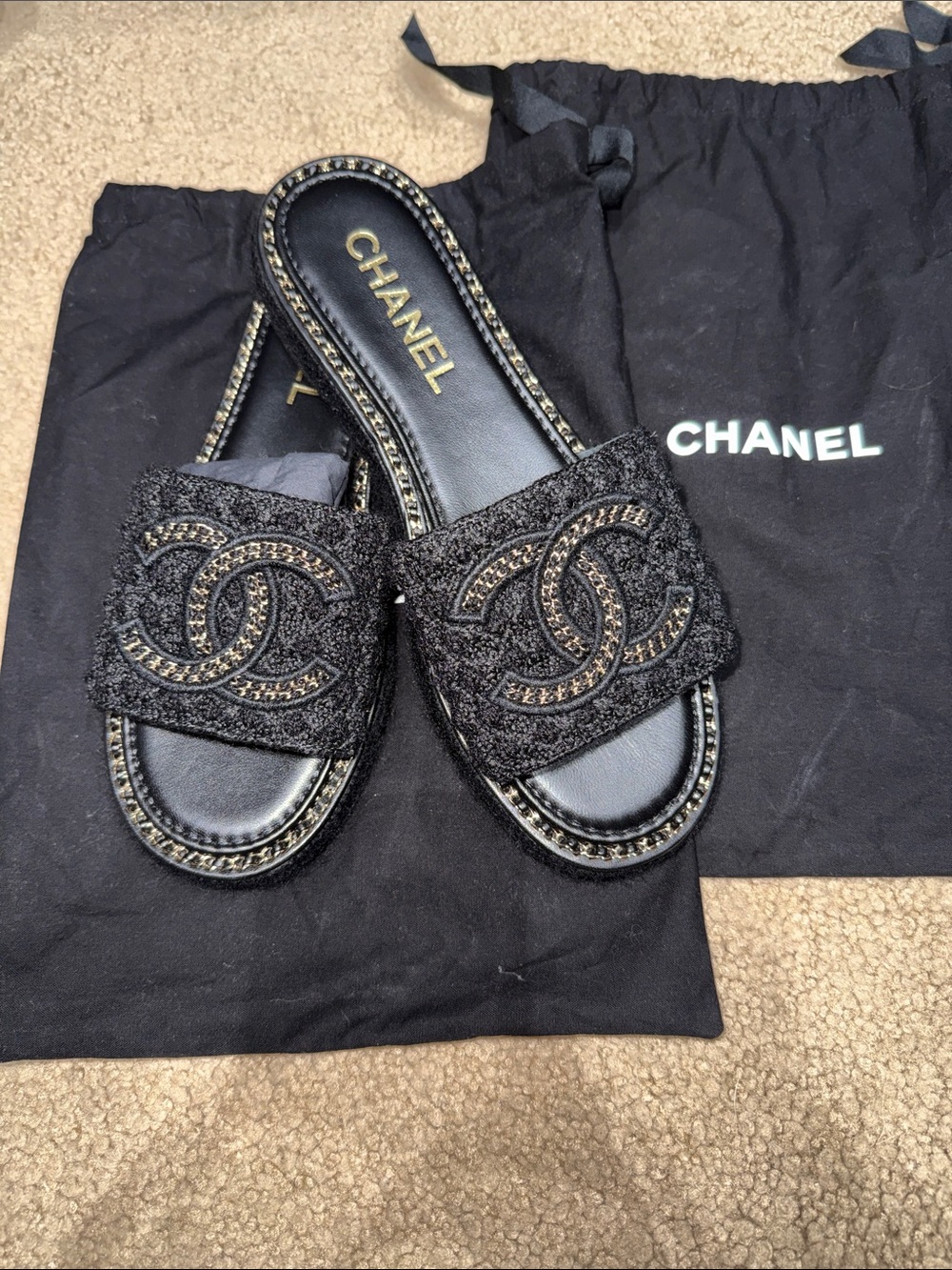 CHANEL Black Tweed CC Logo Slide Sandals w/ Chain Trim
Brand New
100% Authentic